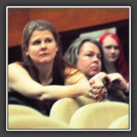 Nancy Schumann (UK) and her companion. In the background: Arianna Giuliani (Italy) and Kristin Bone (California, US)